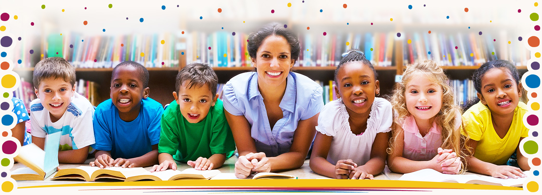 young teacher and kids lying on floor in library – WavebreakmediaMicro@stock.adobe.com